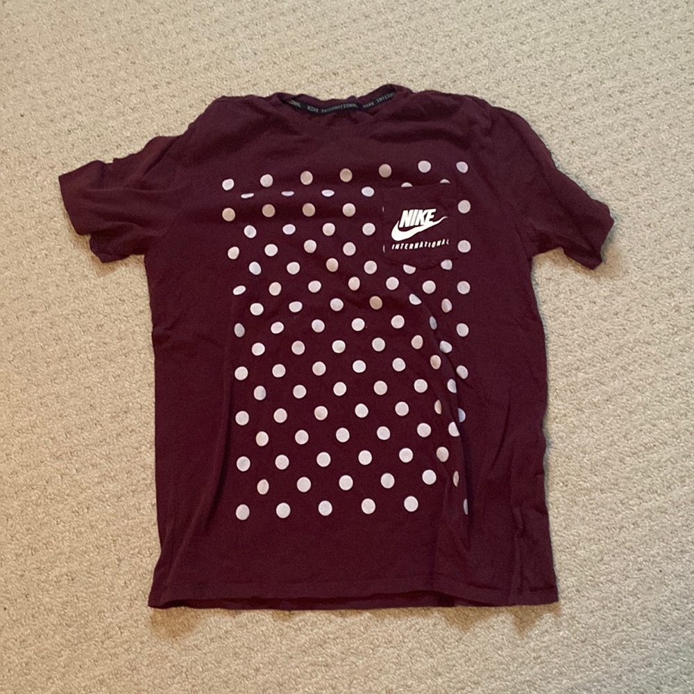 Men’s Nike shortsleeve tshirt with front pocket. Size Large but fits like Medium